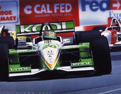 Paul Tracy (No.26 Kool Team Green) wins the 2000 CART/IndyCar GP at Long Beach from Hélio Castroneves (No.3 Team Penske) after starting 17th.